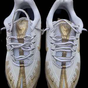 Nike White and Gold Athletic Shoes